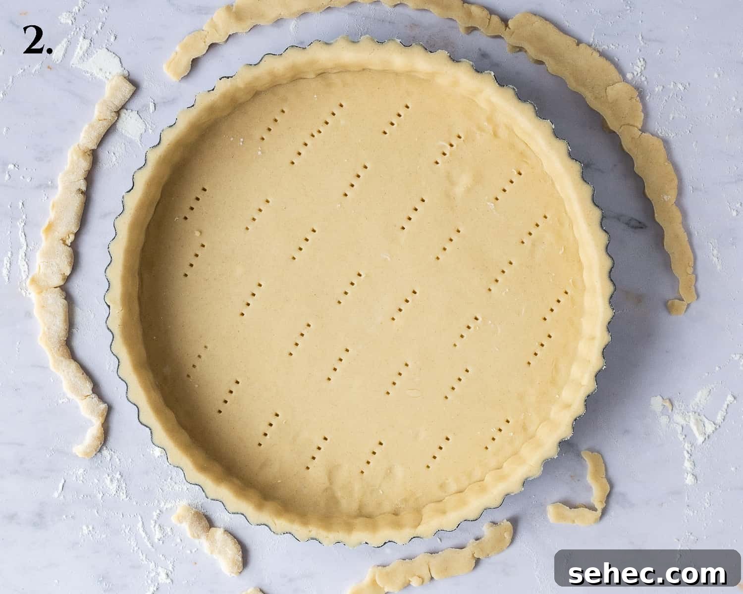 Vegan Caramelized Pineapple Coconut Tart 6 Pastry lined in the tart tin.