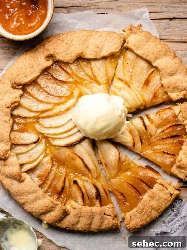 Ricotta and Sour Cherry Crostata 9 An overhead shot of an apple crostata with some slices cut and a scoop of ice cream on top