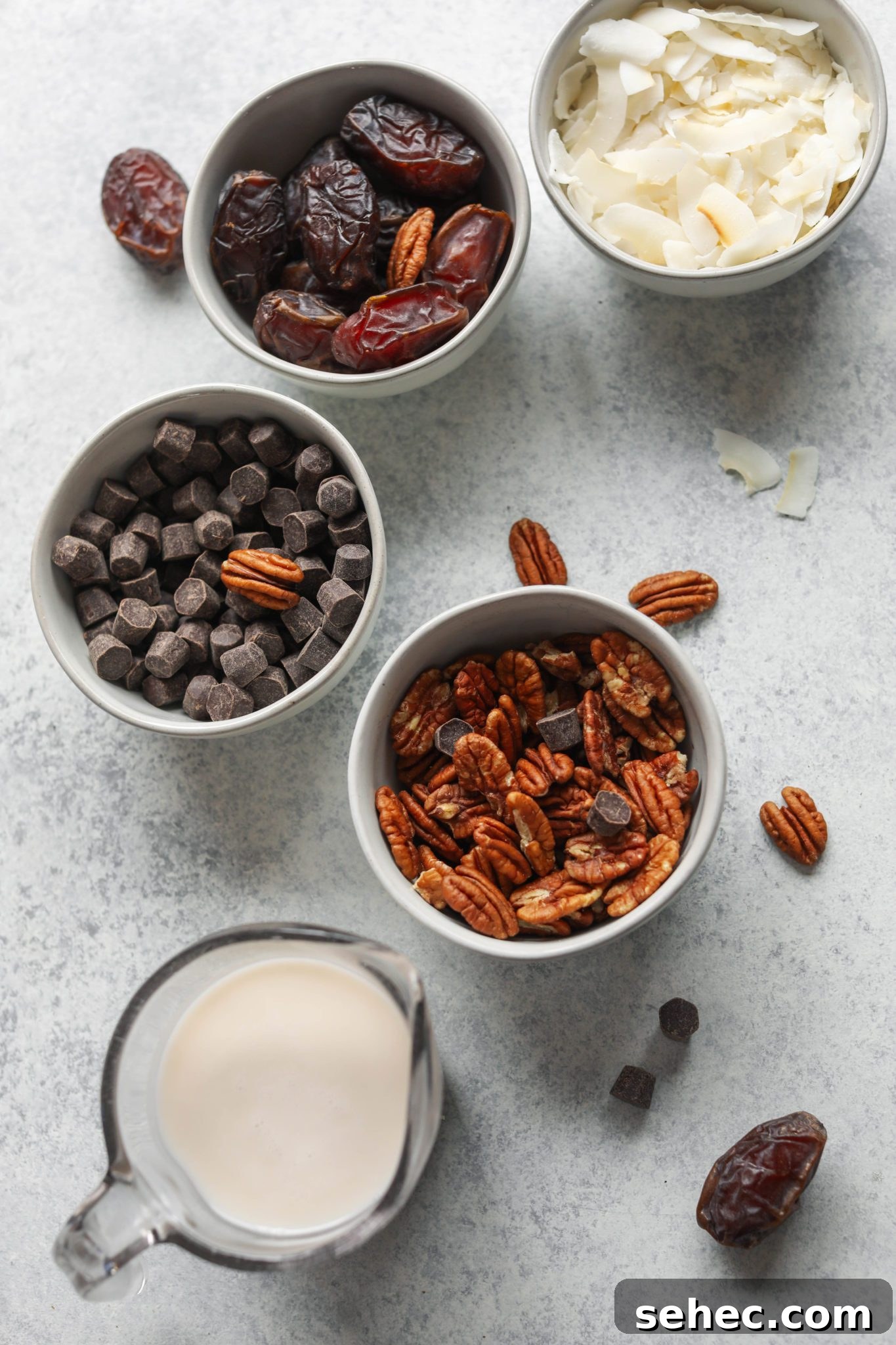 Vegan Dark Chocolate Pecan Pie Recipe 3 shredded coconut, Medjool dates, dark chocolate chips, pecans, and almond milk on board by Flora & Vino
