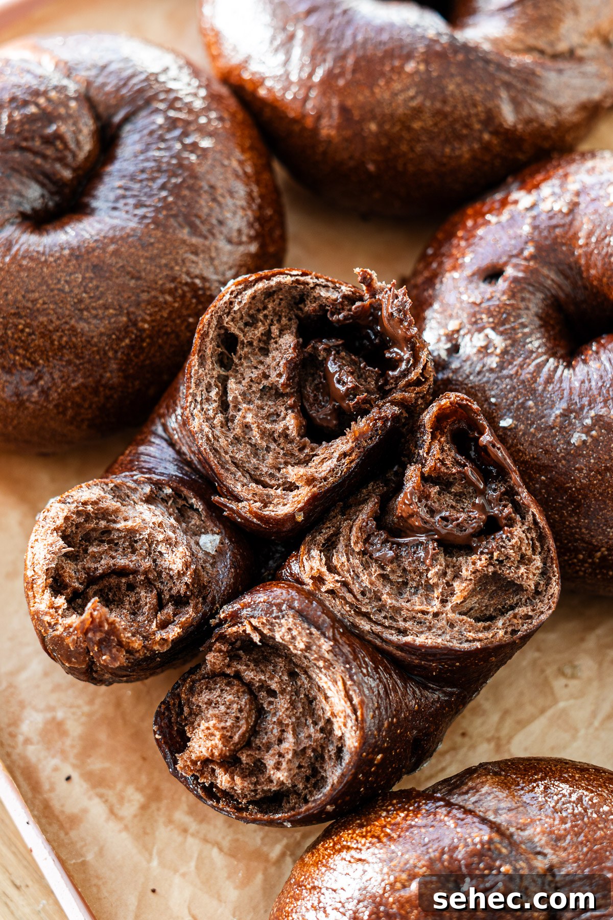 Homemade Chocolate Bagels with Rich Cocoa Flavor 7 cross section of shio pan butter chocolate bagel on a tray