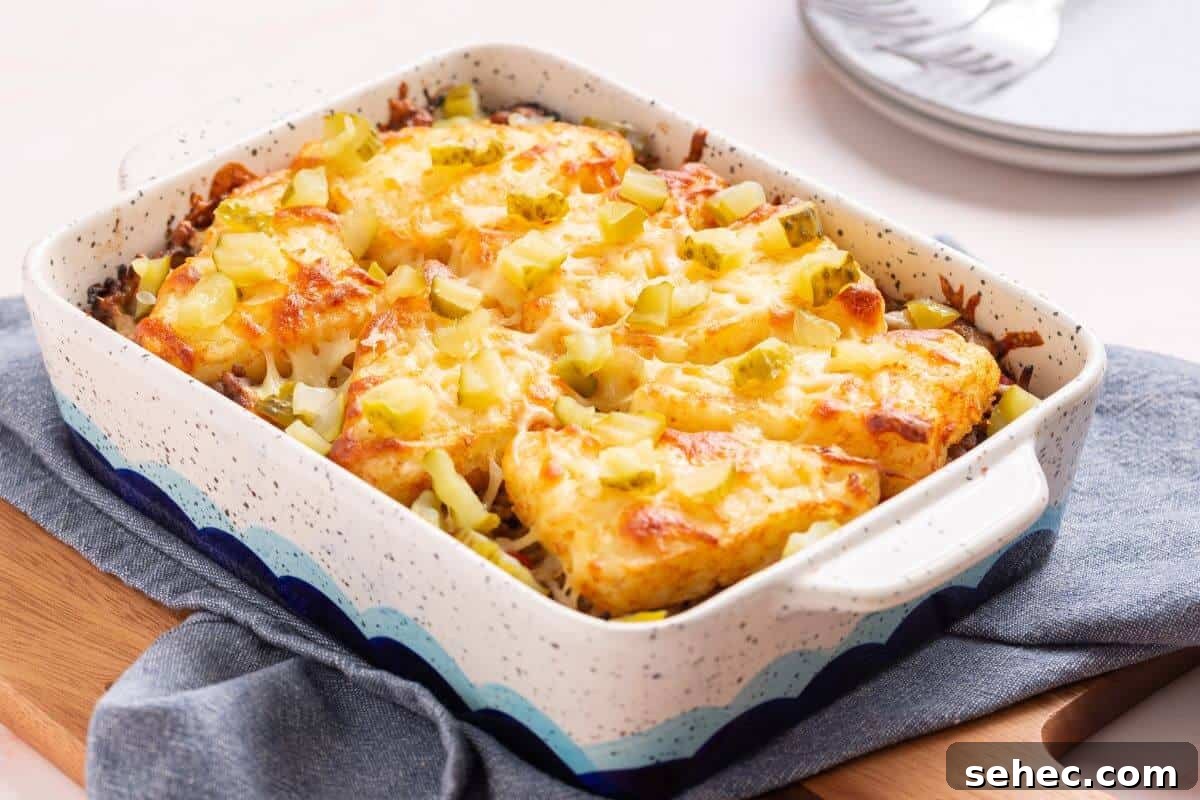 19 Weeknight Dinner Recipes You’ll Want to Cook Again 17 Cheesy hashbrown topped casserole in baking pan.