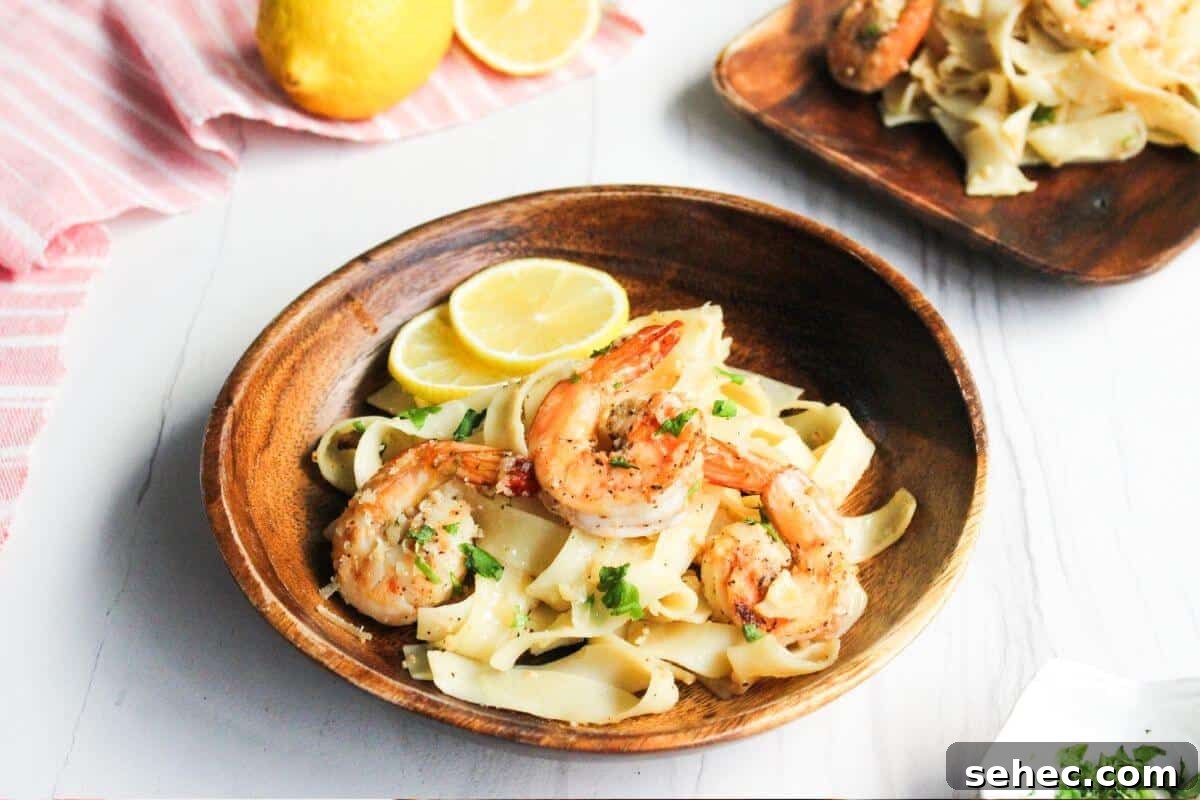 19 Weeknight Dinner Recipes You’ll Want to Cook Again 18 A bowl of shrimp pasta with lemon and parsley.