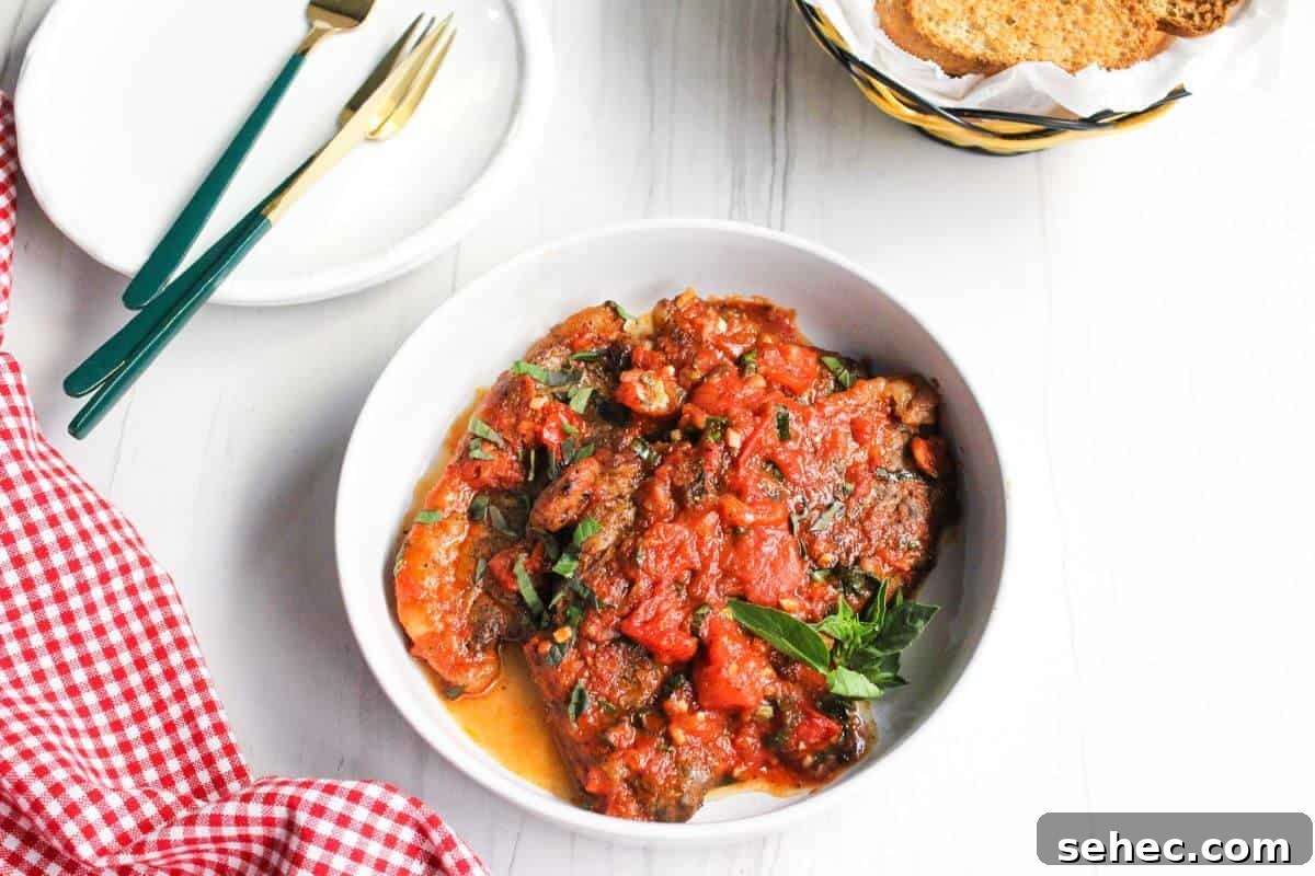 19 Weeknight Dinner Recipes You’ll Want to Cook Again 19 Serving of steak pizzaiola a bowl.