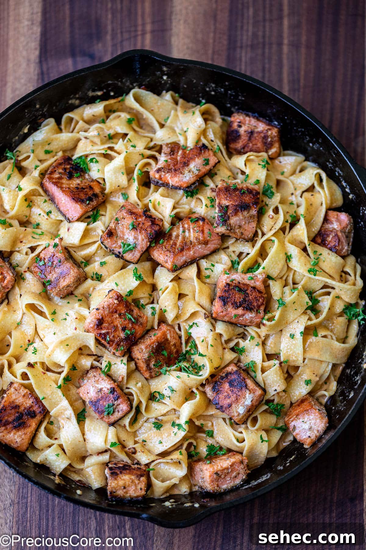 Creamy Cajun Salmon Pasta 11 Cajun pasta with salmon pieces added.