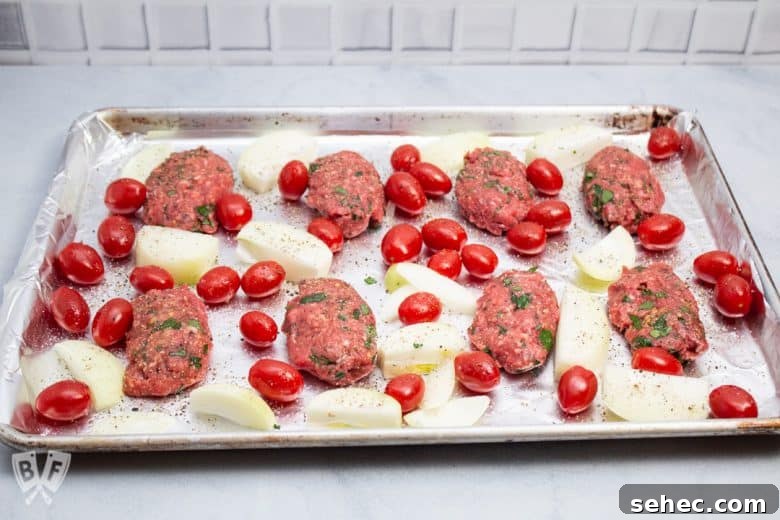 Sheet Pan Chicken Kebabs with Vegetables 5 Overhead view of Broiler Kebab Sheet Pan Meal ready for the oven
