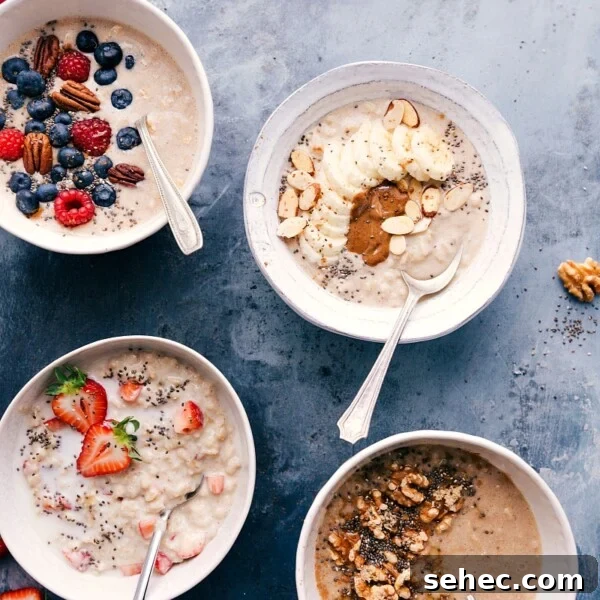 Four bowls of oatmeal, all with different toppings.