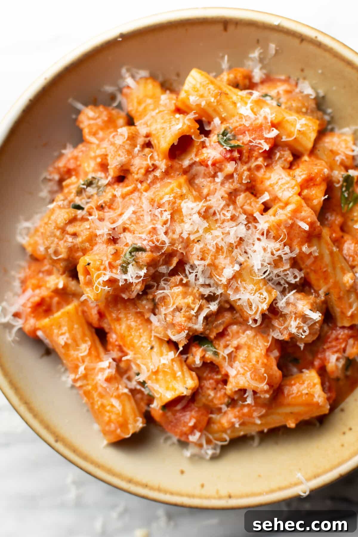 Creamy Sausage Rigatoni Pasta Recipe 2 a bowl of Italian sausage rigatoni