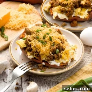High Protein Loaded Baked Sweet Potato Breakfast 14 A loaded high-protein sweet potato with egg, ground turkey sausage, cheddar cheese, and chives.