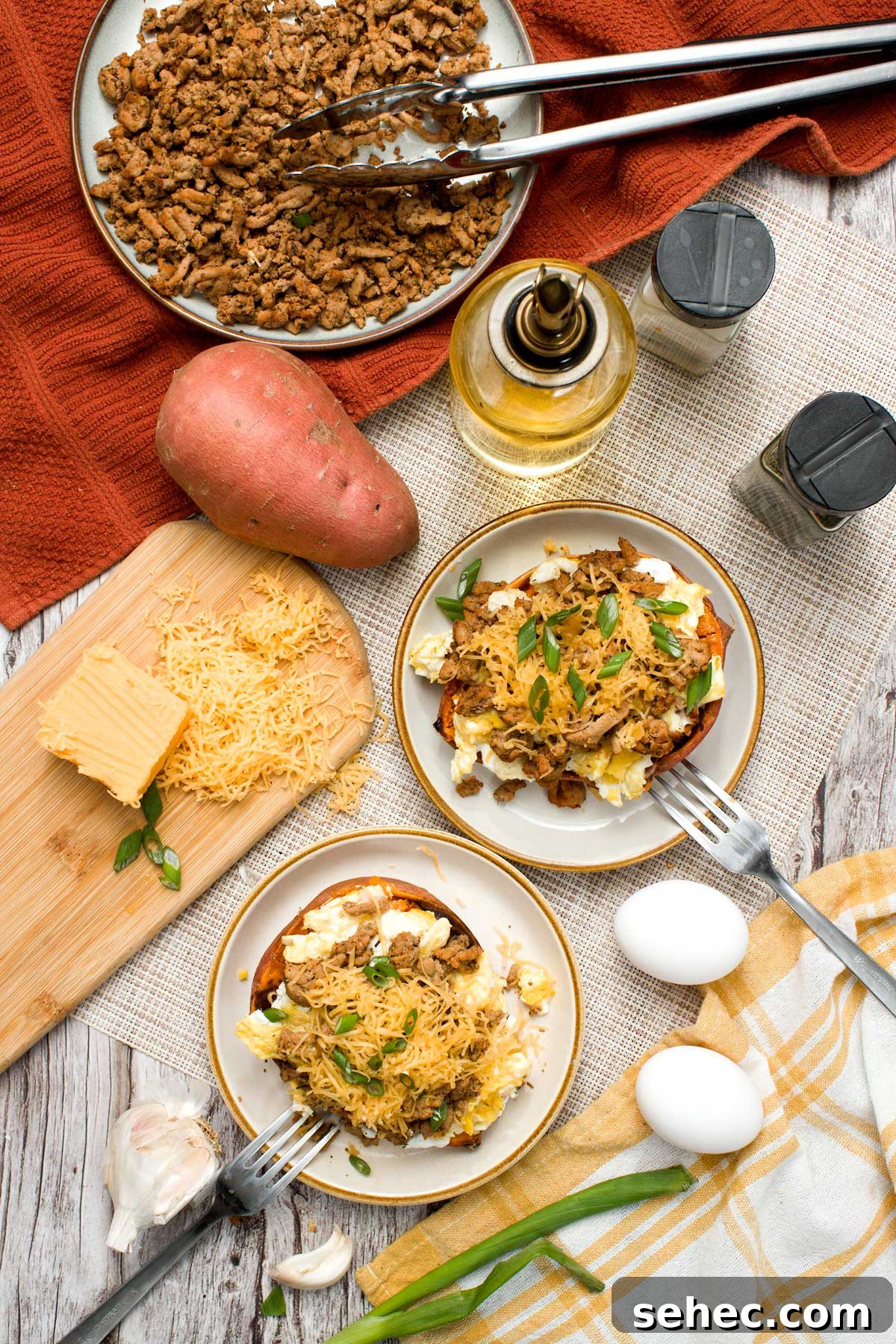 High Protein Loaded Baked Sweet Potato Breakfast 3 Top view of a loaded breakfast sweet potato on a plate.