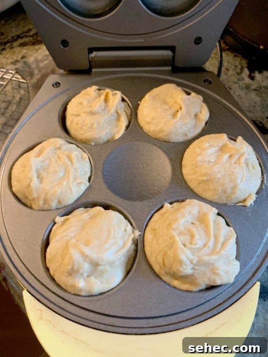 Gluten-Free Peanut Butter Donuts Recipe 7 Some donut batter in a donut maker.