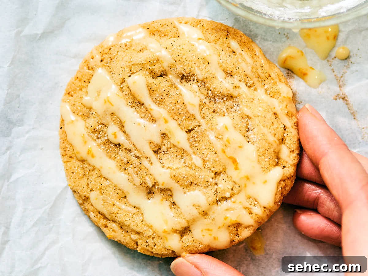 Orange icing on Cardamom Sugar Cookies.