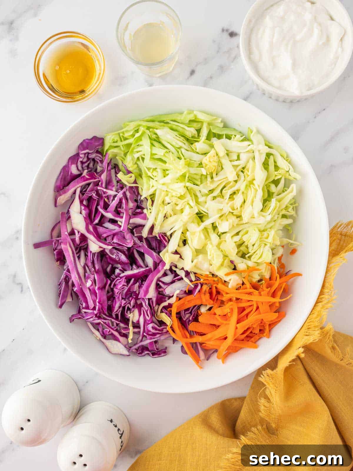 BBQ Pulled Chicken Burger with Smoky Sauce 4 Preparing fresh coleslaw ingredients.