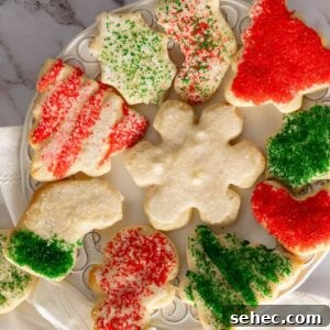 Soft Cream Cheese Sugar Cookies From Scratch 11 Birds eye view of cream cheese sugar cookies for Christmas on decorative plate.