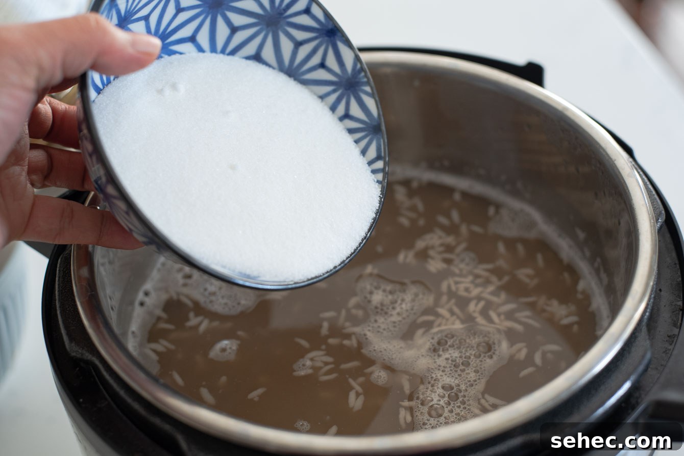 Homemade Sikhye Korean Sweet Rice Drink Recipe 13 Sugar added to fermented sikhye in Instant Pot