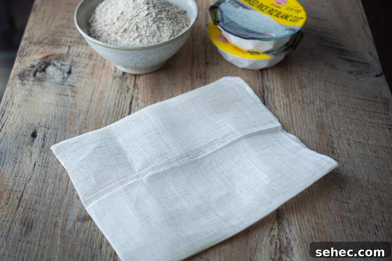 Homemade Sikhye Korean Sweet Rice Drink Recipe 5 Clean fabric pouch used to soak barley malt