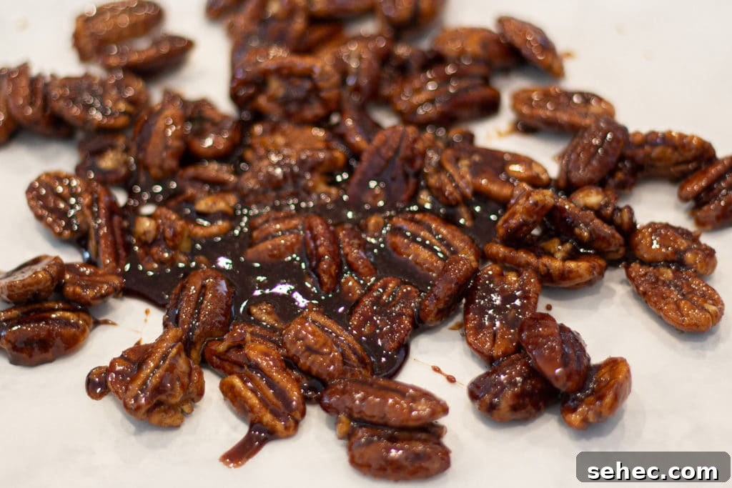 5-Minute Candied Pecans Recipe 2 Candied Pecans on Parchment Paper
