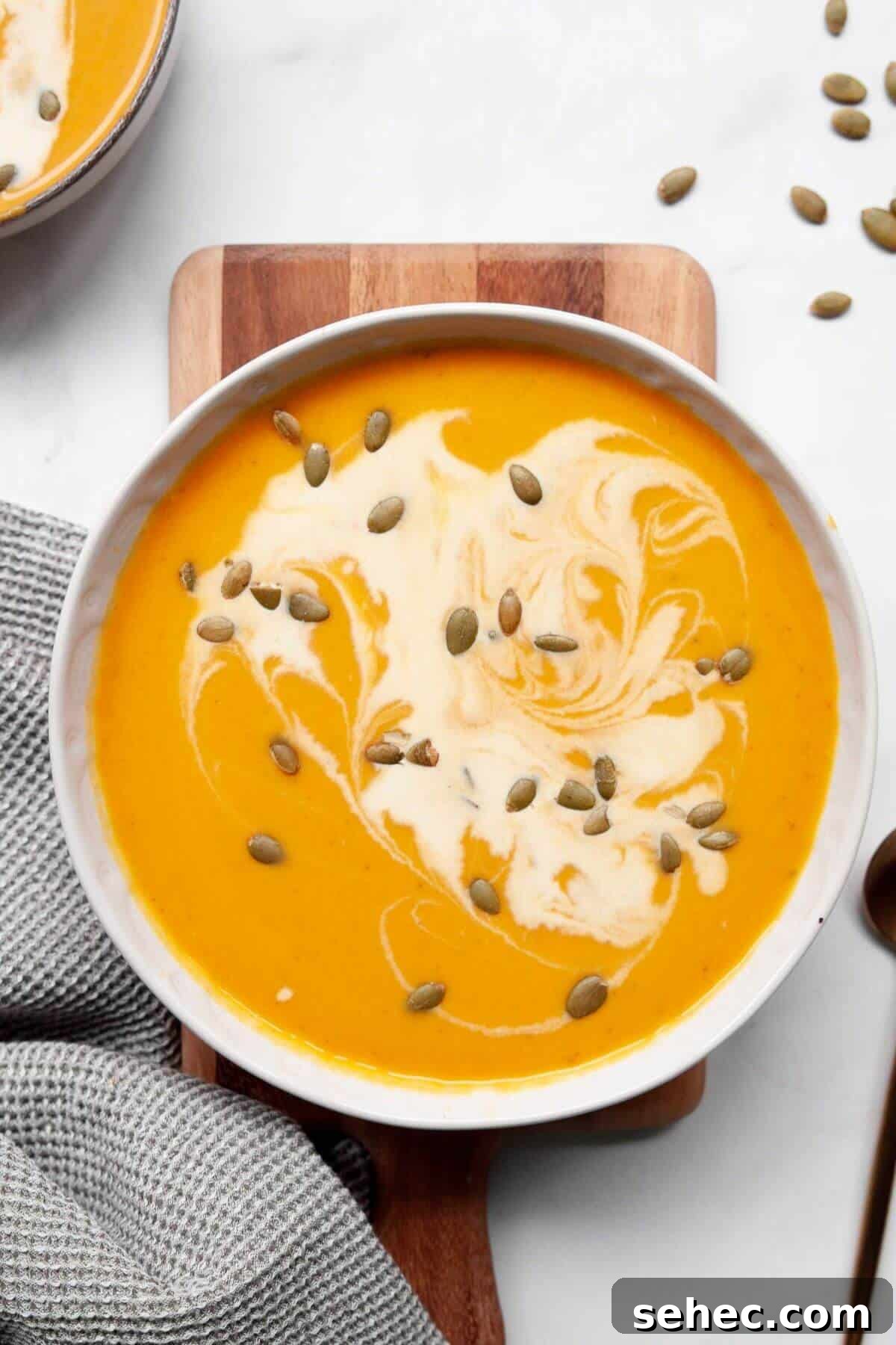 Creamy Pumpkin Sweet Potato Soup Recipe 9 Creamy and cozy pumpkin sweet potato soup with coconut milk and pepitas.