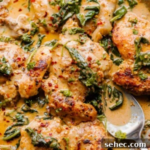 One Pot Creamy Spinach Chicken 2 overhead shot of boneless skinless chicken thighs in a creamy sauce with spinach