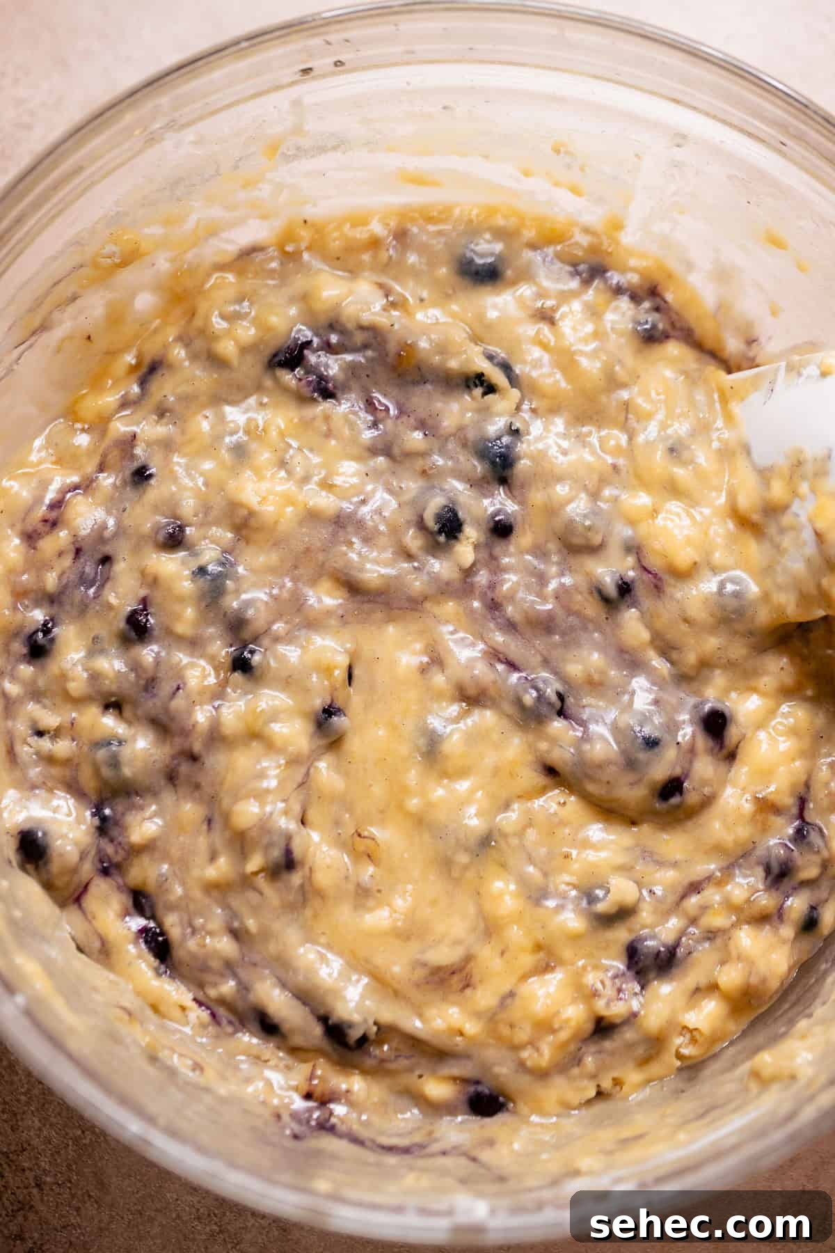 Sugar Crusted Blueberry Banana Bread 4 Thick banana bread batter with blueberries folded into the mixture.