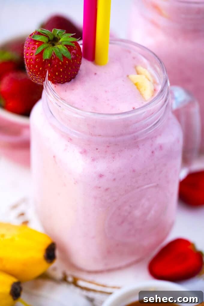 Creamy Strawberry Banana Smoothie Recipe 11 Homemade pink strawberry banana smoothie.
