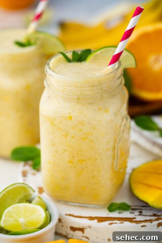 homemade tropical smoothie with pineapple and mango.