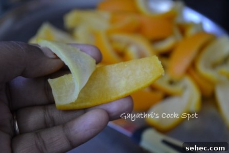 Removing pith from orange peel