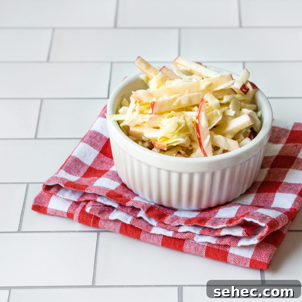 Crisp Apple Cabbage Slaw Recipe 2 Apple and cabbage slaw in a bowl