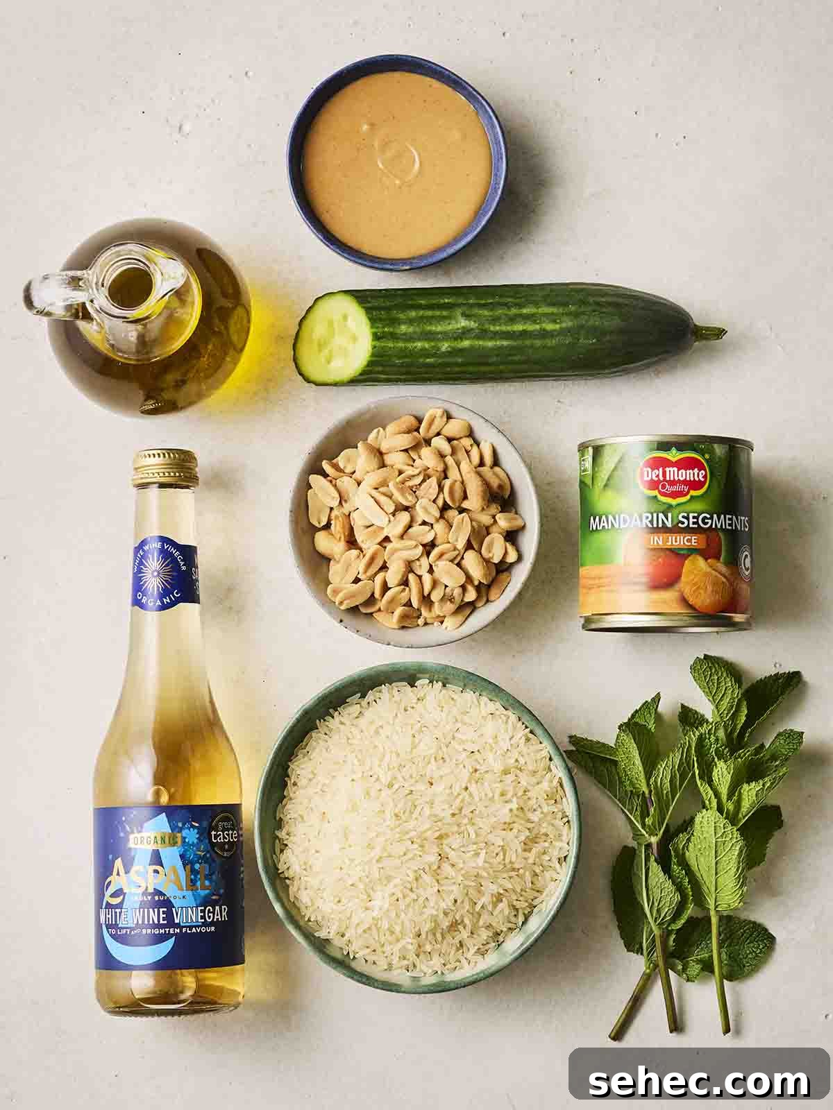 Rice Salad with Fresh Vegetables and Herbs 4 The ingredients for making a rice salad laid out on a counter.