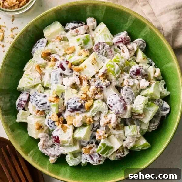 Rice Salad with Fresh Vegetables and Herbs 8 A chopped Walford Salad in a green bowl, with a mayo and Greek yoghurt dressing.