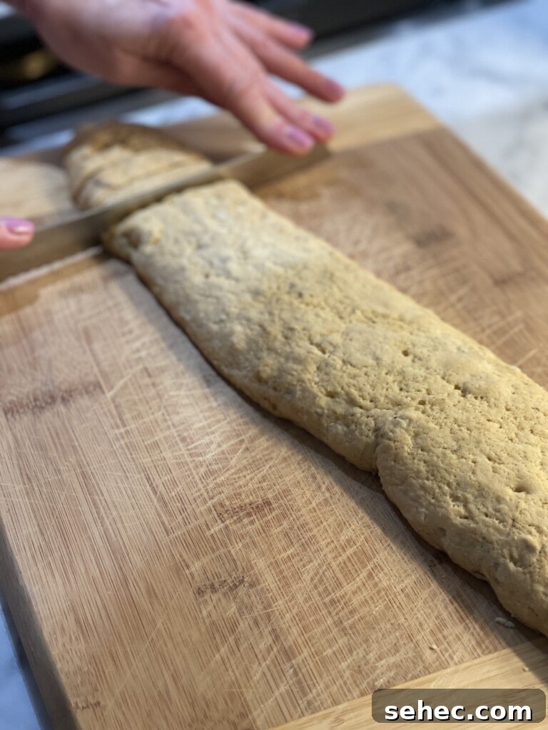 slicing almond biscotti
