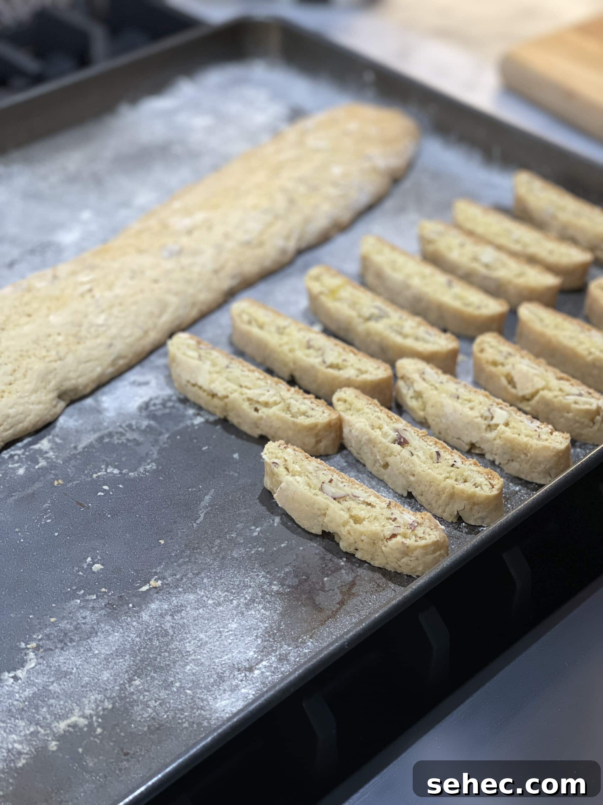Mom's Almond Biscotti Recipe 19 sliced biscotti on baking sheet