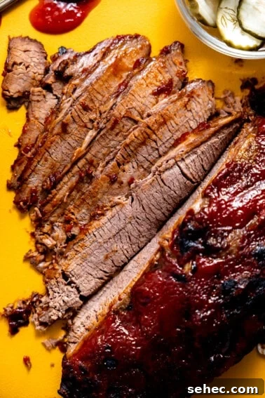 Slow Cooker Corned Beef Recipe for Tender Slices 14 Sliced beef brisket with bbq sauce.