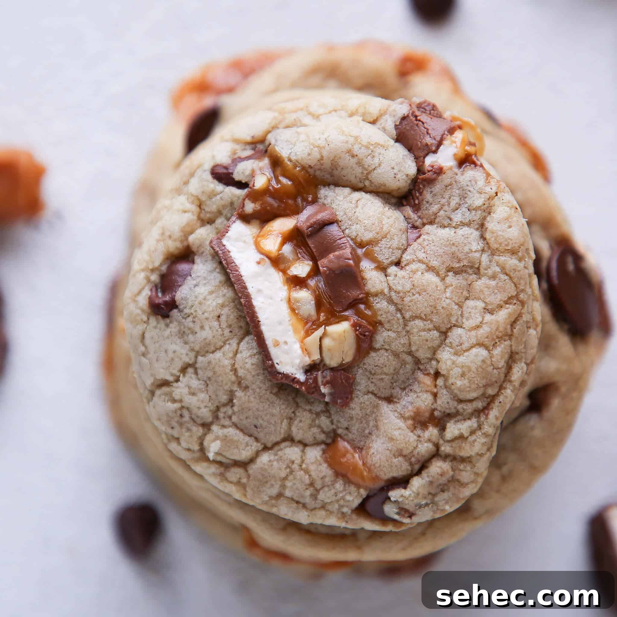 Brown Butter Snickers Cookies Stuffed With Caramel 4 Caramel Stuffed Brown Butter Snickers Chocolate Chip Cookies stacked