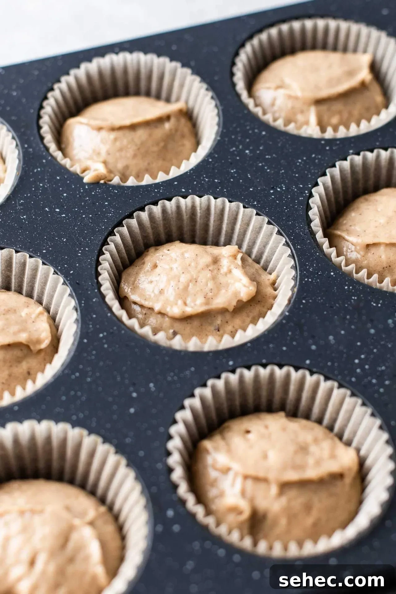Maple Chai Spice Cupcakes 4 maple cupcakes batter portioned into cupcake cups