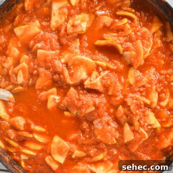 Zucchini Marinara Recipe 7 Close up of zucchini cooking with marinara sauce