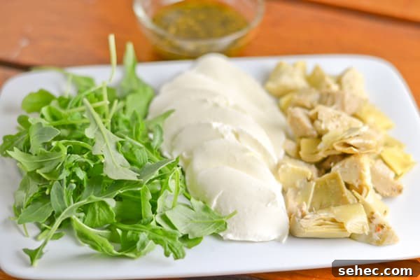 Artichoke Mozzarella Pizza with Arugula Pesto 3 Artichoke, Mozzarella and Arugula Pesto Pizza