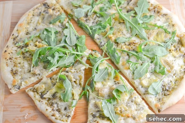 Artichoke Mozzarella Pizza with Arugula Pesto 5 Artichoke, Mozzarella and Arugula Pesto Pizza