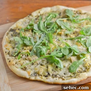 Artichoke Mozzarella Pizza with Arugula Pesto 6 Artichoke, Mozzarella and Arugula Pesto Pizza