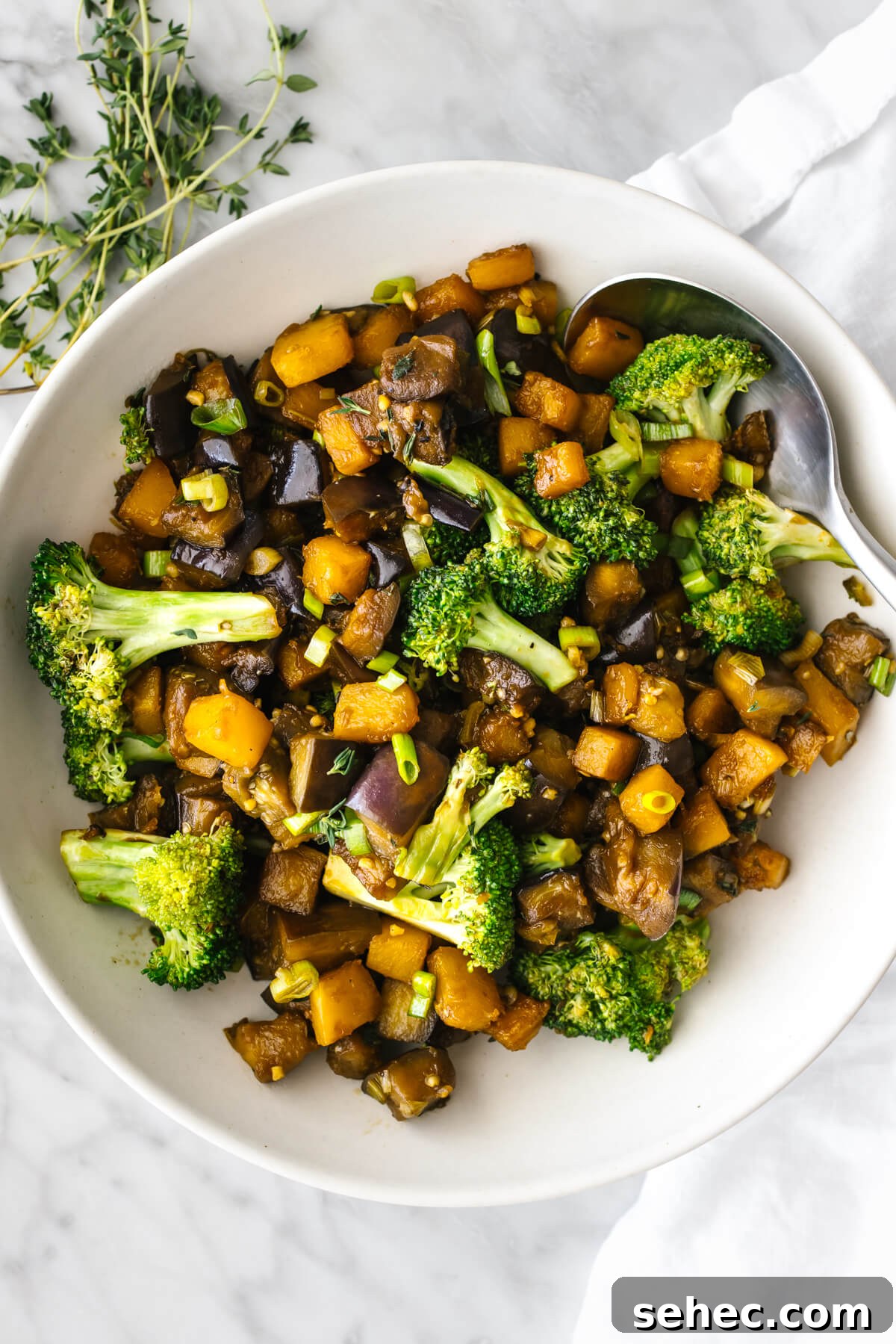 Butternut Squash Recipes for Soups, Sides, and Mains 3 A bowl of butternut squash and eggplant stir fry