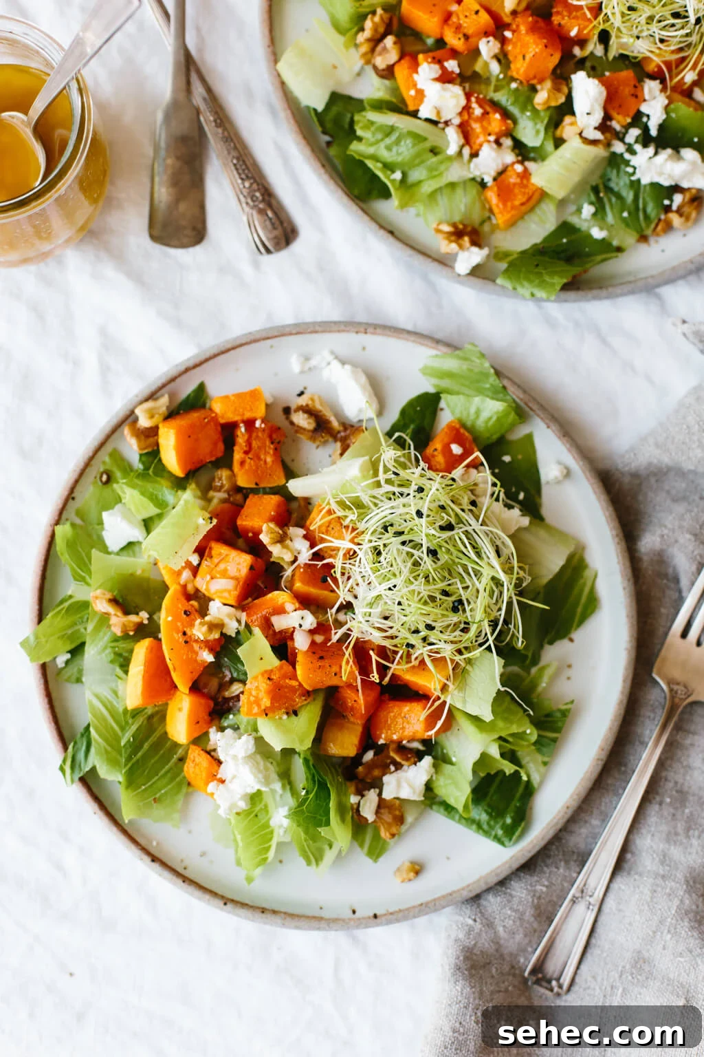 Butternut Squash Recipes for Soups, Sides, and Mains 9 This roasted butternut squash salad is easy and comes together fast! There's just a handful of ingredients including roasted butternut squash, romaine lettuce, goat cheese, walnuts and sprouts but it's packed with flavor for a delicious fall salad recipe.