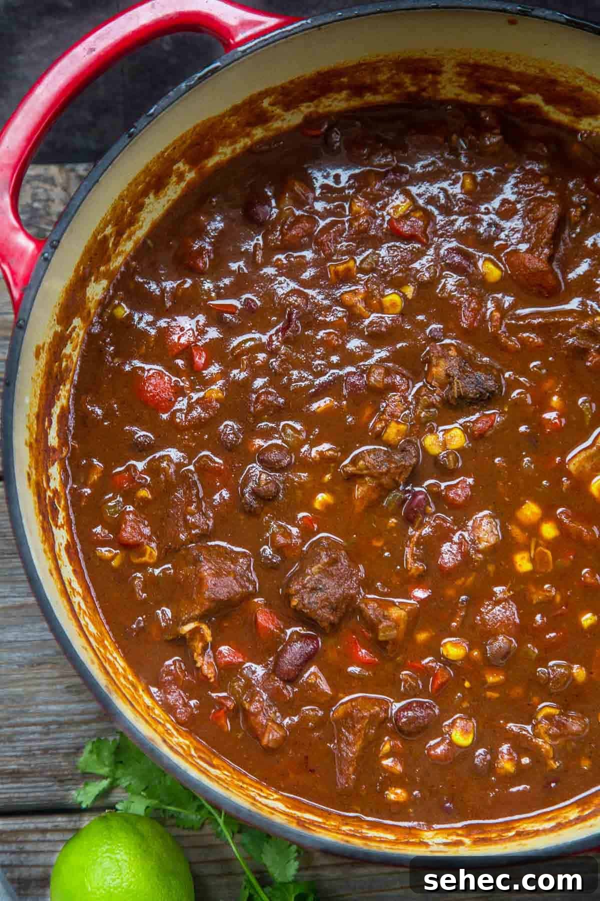 Award Winning Smoked Brisket Chili Recipe with Video 2 Smoked Brisket Chili in a dutch oven