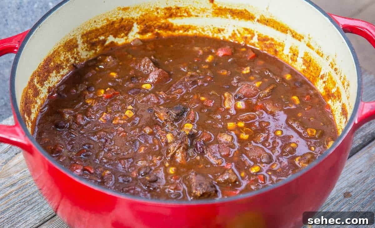 Award Winning Smoked Brisket Chili Recipe with Video 5 Brisket Chili in a dutch oven
