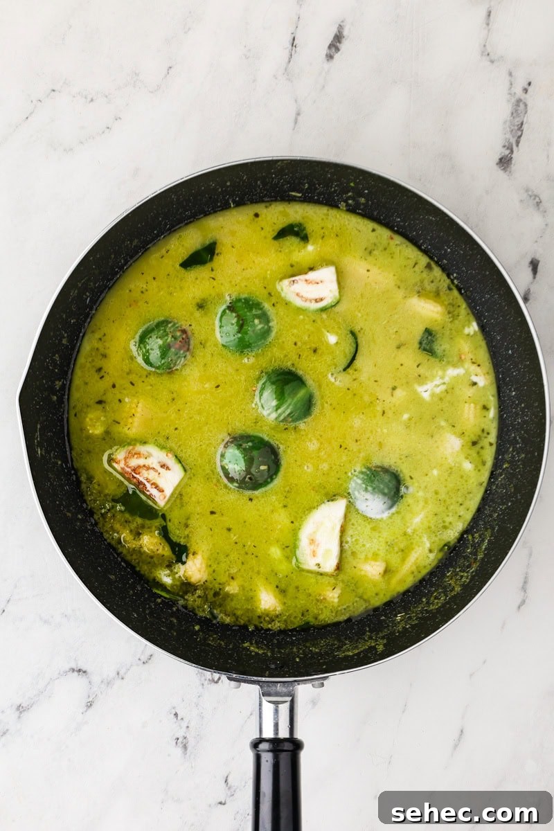 Thai Green Tofu Curry Recipe 10 Aromatics and vegetables added to the pan for Thai green curry.