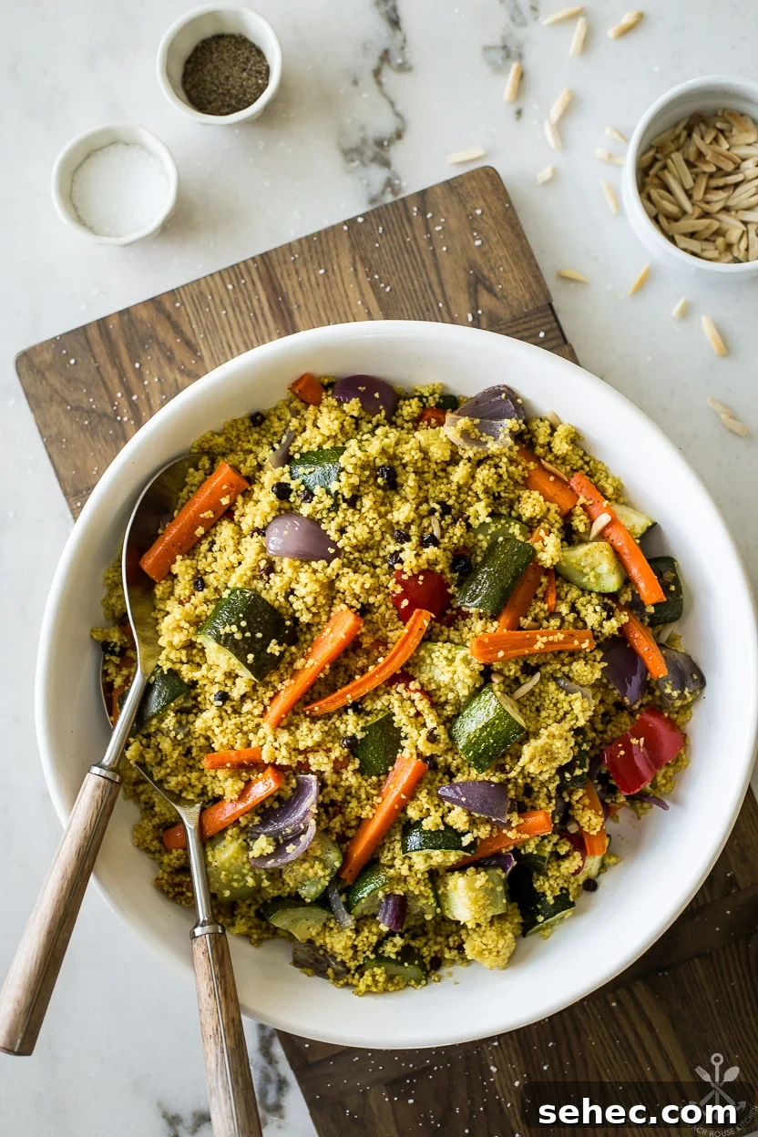 Roasted Vegetable Couscous Recipe 10 Overhead photo of a serving dish of roasted vegetable couscous