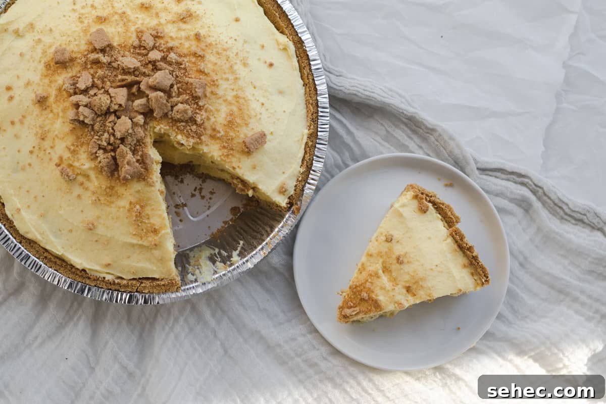 vanilla pudding pie with a slice cut out