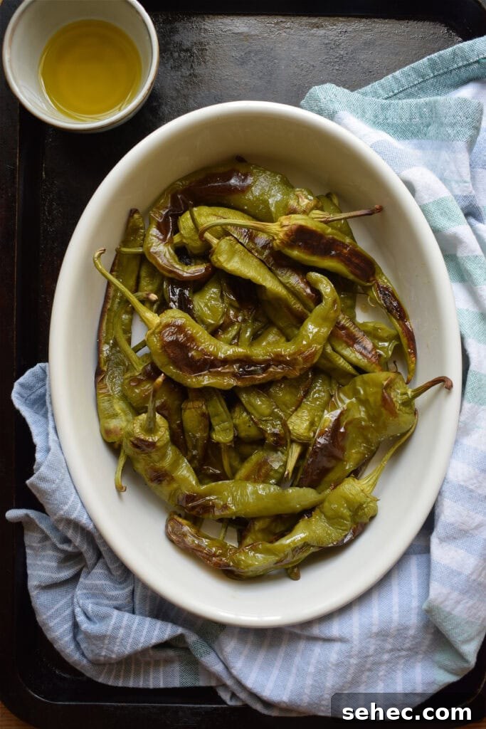 Italian Oven Roasted Green Peppers Recipe 2 overhead view of Italian roasted green peppers on a baking sheet
