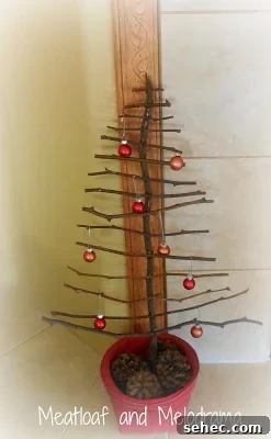 Rustic twig Christmas tree by the fireplace