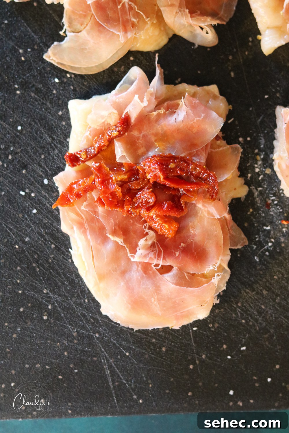 Grilled Chicken Involtini with Prosciutto 7 sun dried tomatoes on prosciutto and chicken