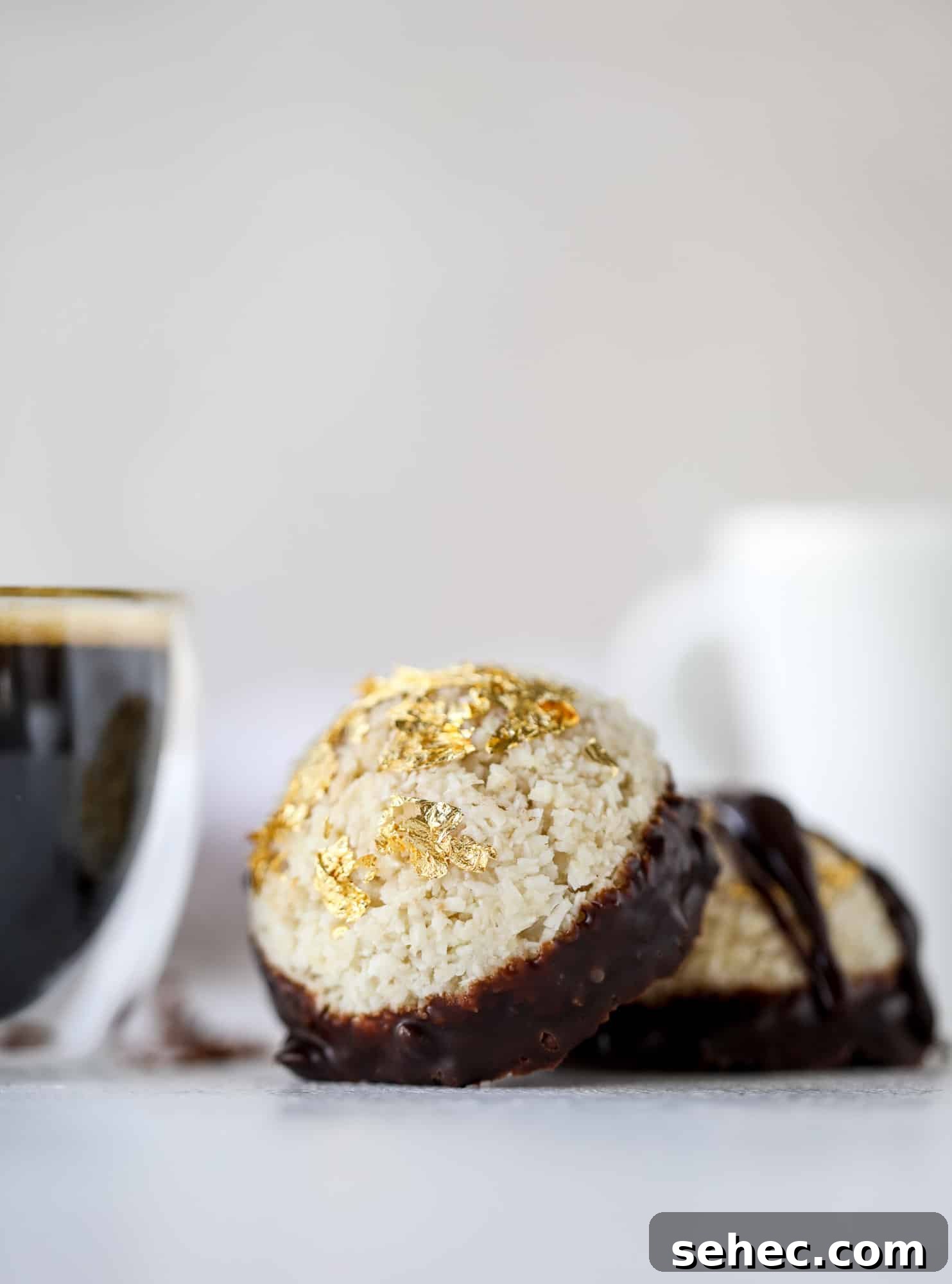 Irish Cream Coconut Macaroons Recipe 2 Classic chewy, slightly gooey coconut macaroons dipped in an irish cream chocolate ganache. Easy to make and gluten free too! I howsweeteats.com #irishcream #coconutmacaroons