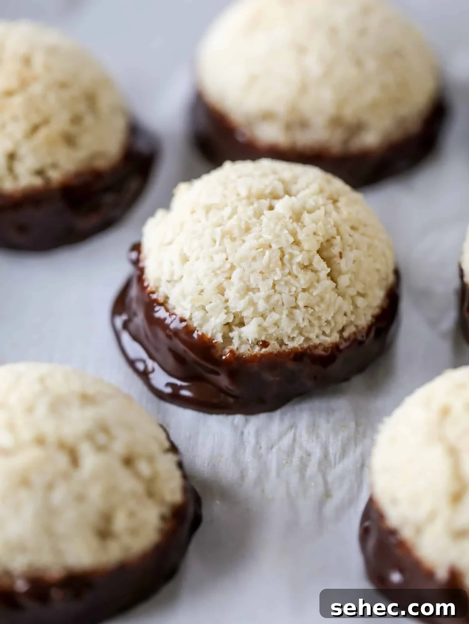 Irish Cream Coconut Macaroons Recipe 5 Classic chewy, slightly gooey coconut macaroons dipped in an irish cream chocolate ganache. Easy to make and gluten free too! I howsweeteats.com #irishcream #coconutmacaroons